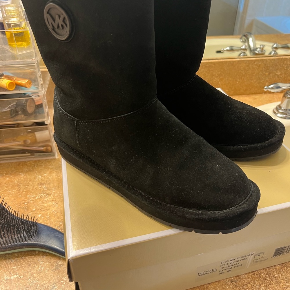 Michael Kors mid winter boots never worn, outside of house